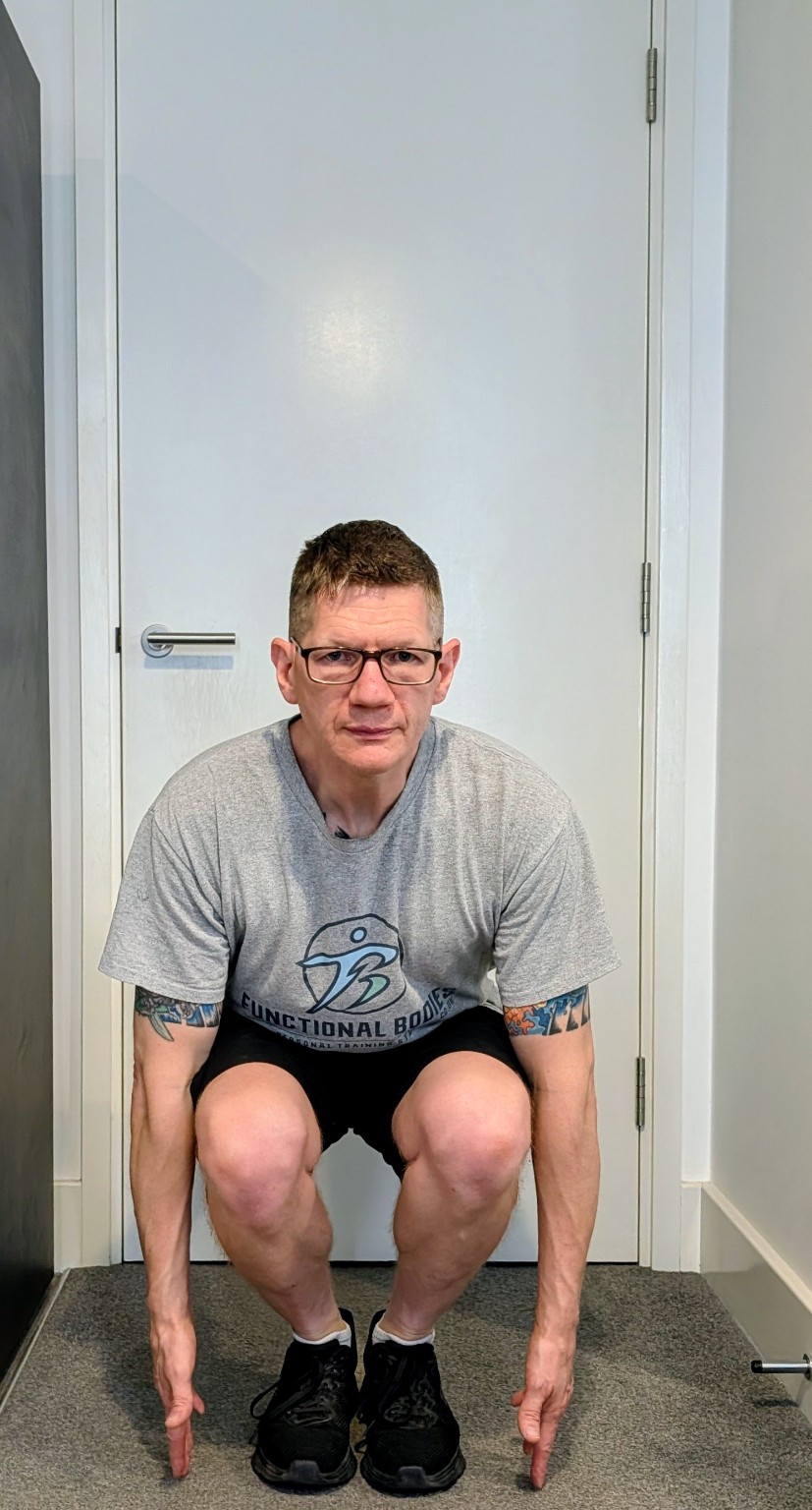 David demonstrating the Squat movement screen